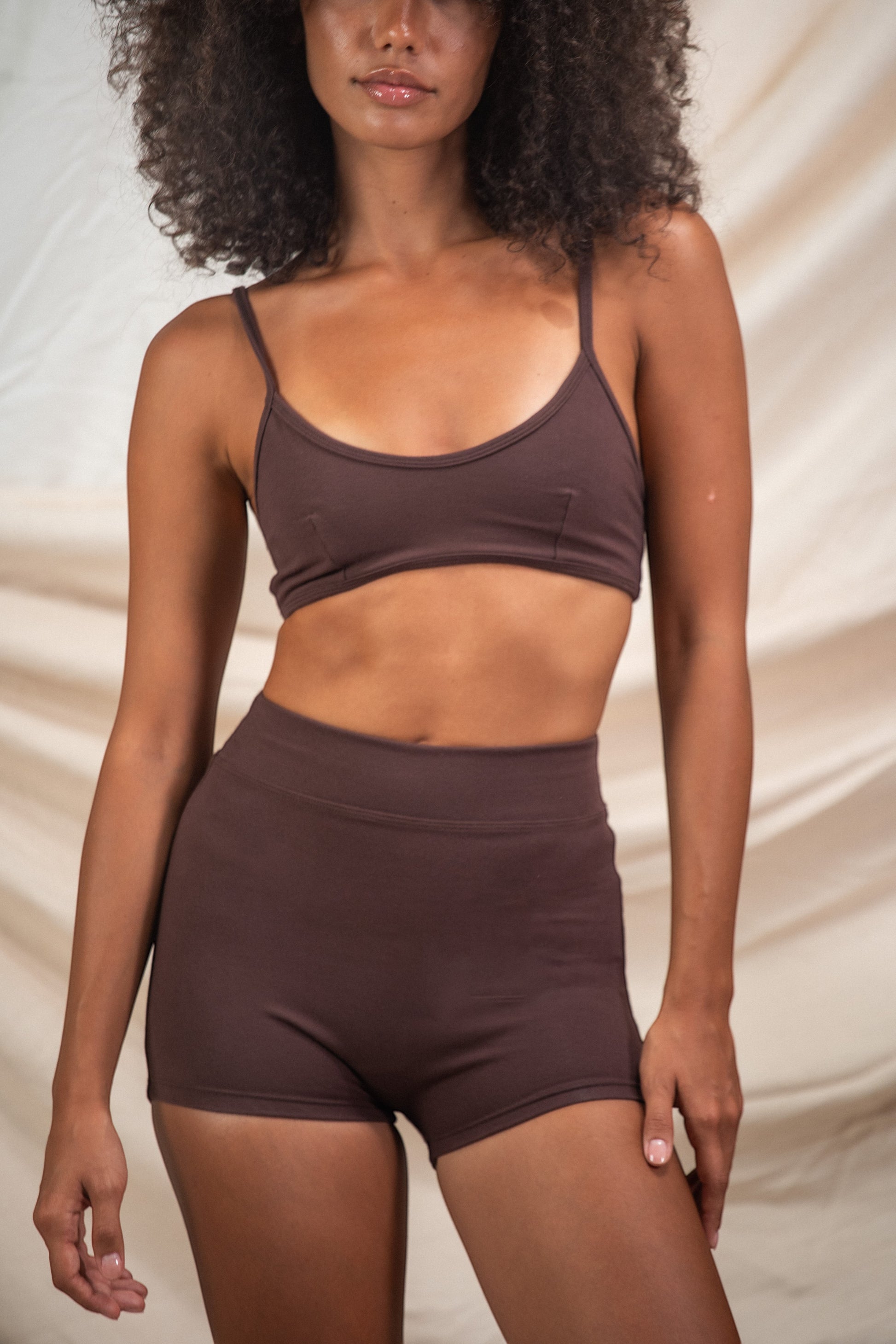 AMI CHÉRIE DESIGN STUDIO Nishi bralette in dark brown, soft cotton blend with adjustable straps and supportive fit.